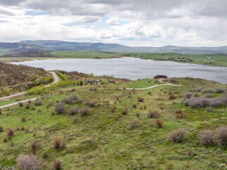 Luxury lakefront property with stunning mountain views.