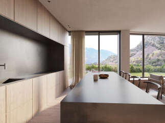 Modern kitchen with stunning mountain views.