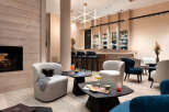 Relax in our luxurious lounge, featuring a cozy fireplace, comfortable seating, and a fully stocked bar.