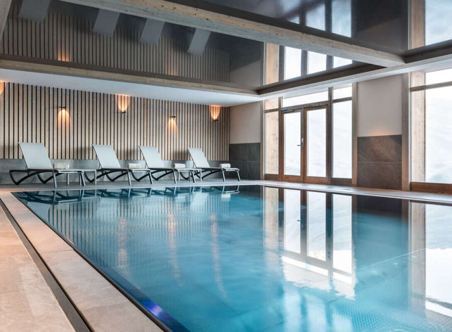 Indulge in a luxurious indoor pool experience at this stunning property.