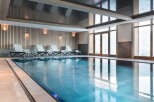 Indulge in a luxurious indoor pool experience at this stunning property.