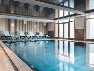 Indulge in a luxurious indoor pool experience at this stunning property.