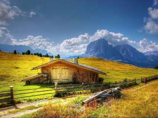 Escape to a picturesque mountain cabin nestled in a stunning landscape.