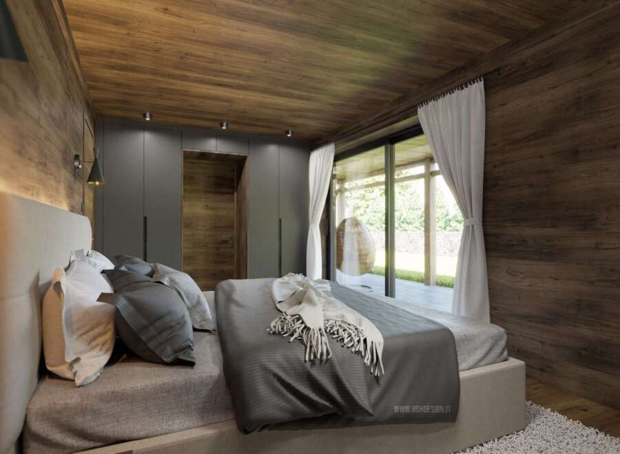 Experience luxury in this stunning bedroom featuring a modern design with wooden accents.
