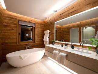 Experience luxury in this stunning bathroom featuring a modern design with a touch of nature.