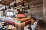 Experience luxury in this stunning property, featuring a beautifully designed bar area.