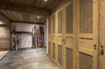 This stunning property boasts a ski storage room, perfect for winter enthusiasts.