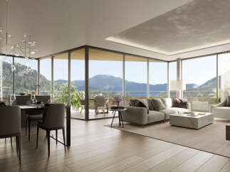 Luxury condo with breathtaking mountain views and expansive windows.