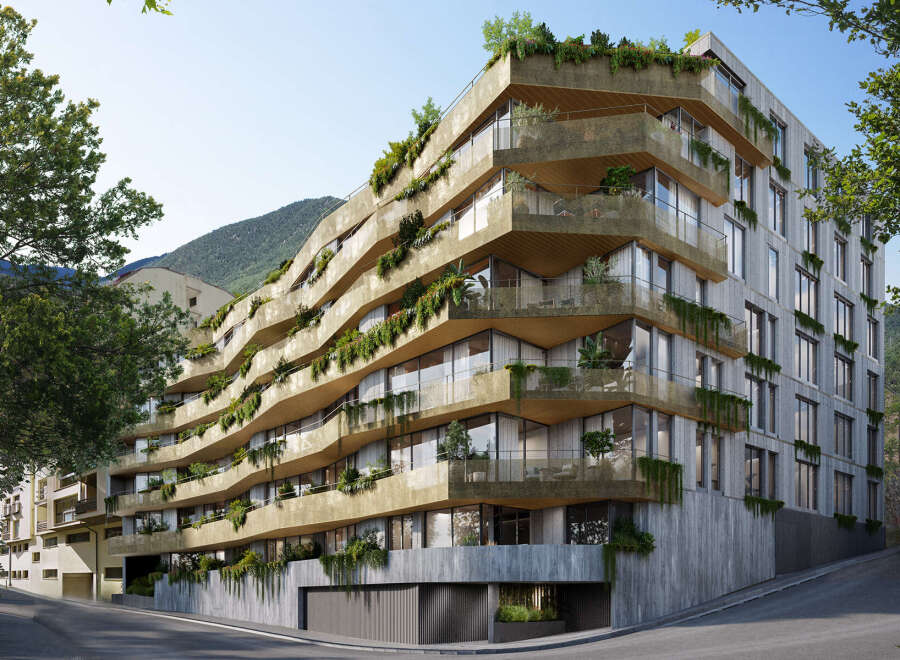 Discover luxury living in this stunning eco-friendly apartment building, nestled in a mountainside setting.