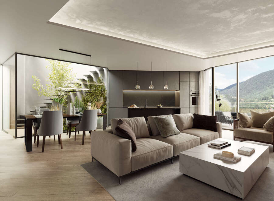 Modern living space with open floor plan, seamlessly connecting the kitchen, dining, and living areas.