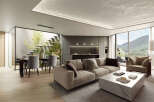 Modern living space with open floor plan, seamlessly connecting the kitchen, dining, and living areas.