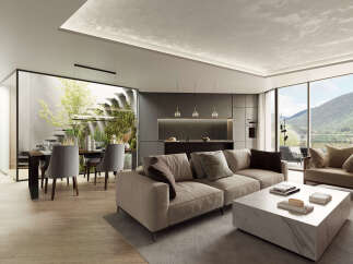 Modern living space with open floor plan, seamlessly connecting the kitchen, dining, and living areas.