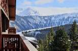 Breathtaking mountain views from this stunning chalet balcony.