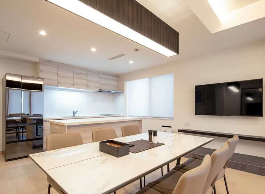 Modern kitchen with sleek appliances and ample counter space.