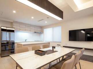 Modern kitchen with sleek appliances and ample counter space.