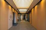 This stunning property boasts a sophisticated entrance with a sleek, modern design.