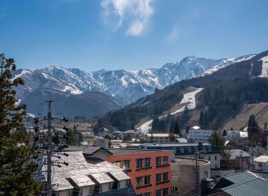 This stunning property boasts breathtaking views of the Japanese Alps, offering a serene escape in a vibrant mountain town.