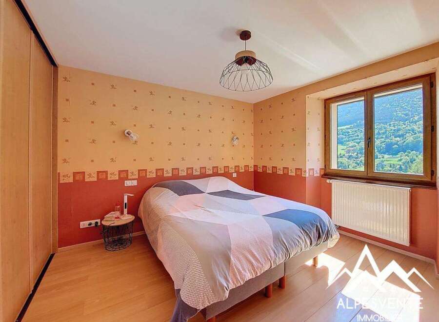 Cozy bedroom with mountain views and built-in closet.
