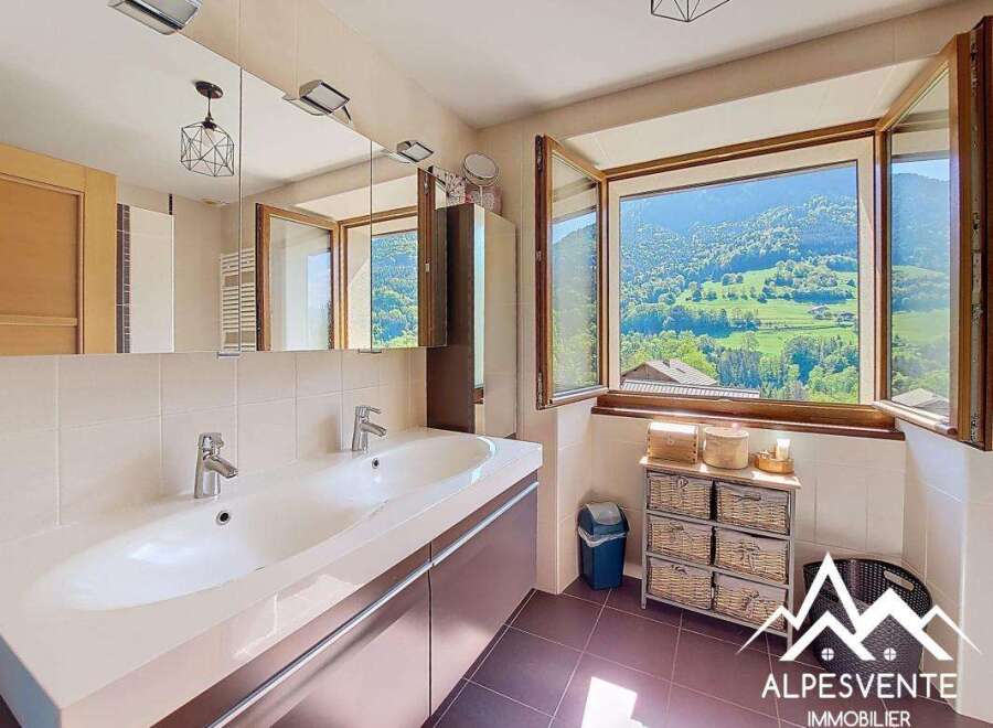 Luxury bathroom with stunning mountain views.