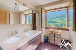 Luxury bathroom with stunning mountain views.