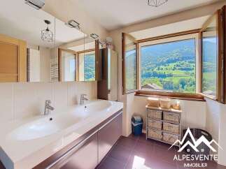 Luxury bathroom with stunning mountain views.