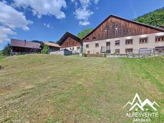 Discover this charming farmhouse nestled in the serene mountains.