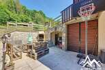 This charming property boasts a spacious outdoor area, perfect for entertaining.