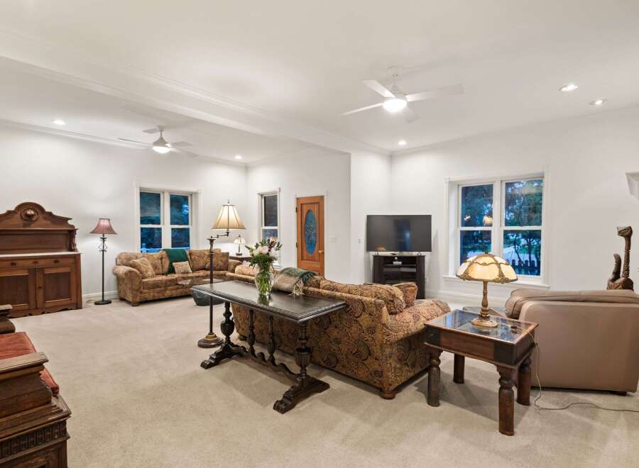 This stunning living room boasts a spacious and open floor plan, perfect for entertaining.