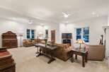 This stunning living room boasts a spacious and open floor plan, perfect for entertaining.