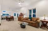 This stunning home boasts an open floor plan, seamlessly connecting the living room, dining area, and kitchen.