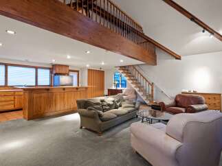 This stunning home boasts a spacious open floor plan, perfect for entertaining.