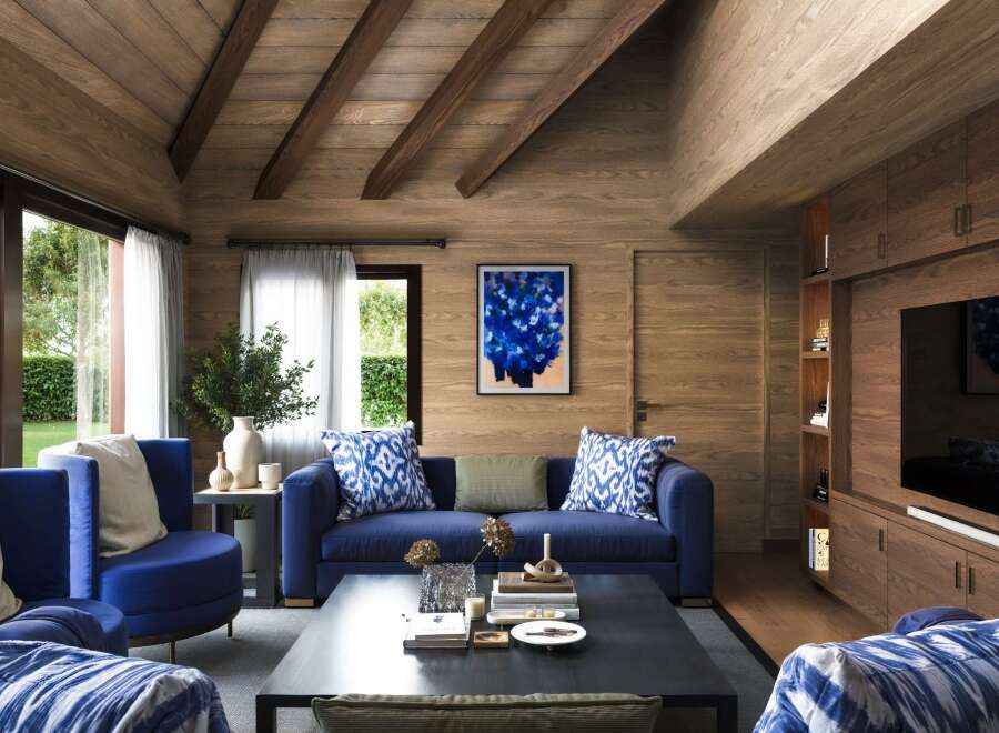 Step into a world of rustic elegance with this stunning living space.