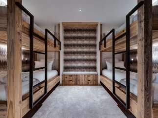 This stunning chalet boasts a unique bunk room, perfect for families or groups.