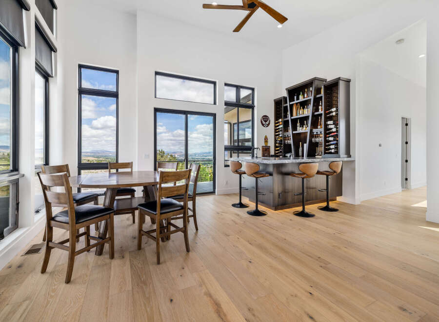 This stunning home boasts a spacious open floor plan with breathtaking views, perfect for entertaining.
