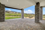 This stunning property boasts a spacious covered patio, perfect for outdoor entertaining.