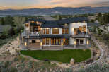 Stunning modern home nestled in the mountains with breathtaking sunset views.