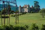 This stunning property boasts a majestic castle as its centerpiece, surrounded by meticulously manicured lawns and lush greenery.
