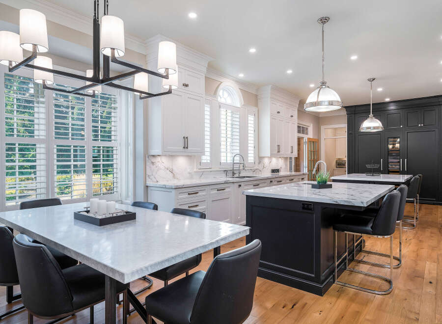 This stunning kitchen boasts a spacious island with seating, perfect for entertaining.