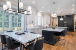 This stunning kitchen boasts a spacious island with seating, perfect for entertaining.