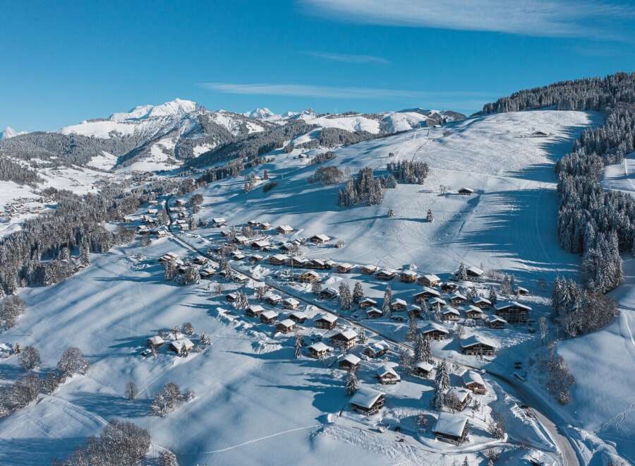 Nestled in a breathtaking snowy landscape, this charming village offers a serene escape.