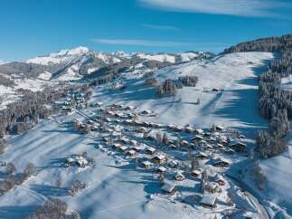 Nestled in a breathtaking snowy landscape, this charming village offers a serene escape.