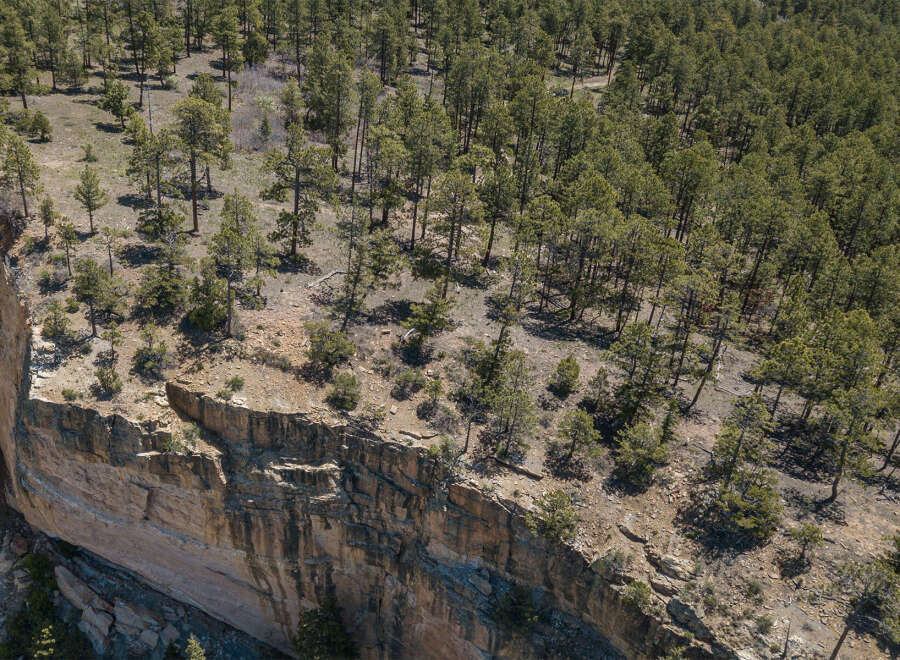 Spectacular cliffside property offering breathtaking views and abundant privacy.