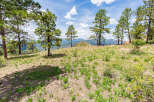 Discover tranquility in this mountaintop property boasting breathtaking panoramic views.