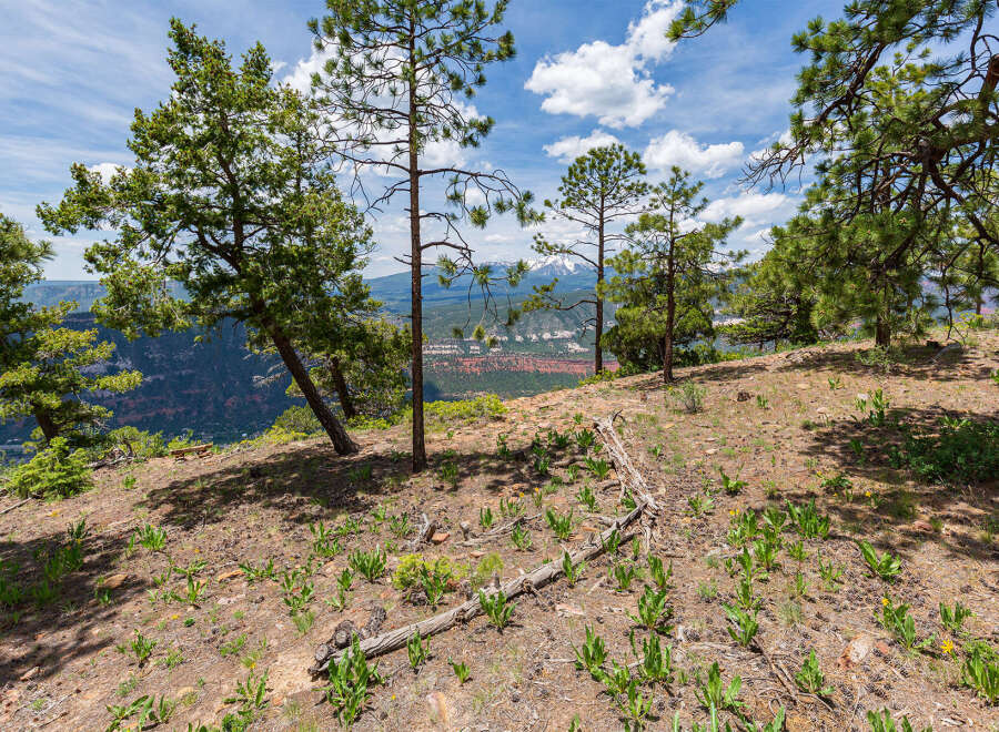 Escape to this stunning mountain property boasting breathtaking panoramic views.