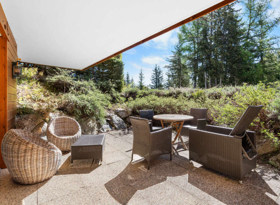 Relax and enjoy the stunning mountain views from your private patio.