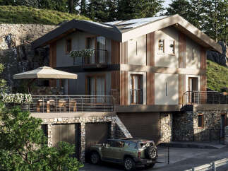 Discover a modern mountain retreat featuring a blend of natural stone and wood accents.