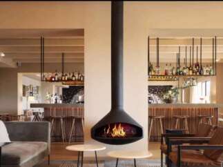 This sophisticated lounge area features a striking suspended fireplace, creating a focal point for relaxation.