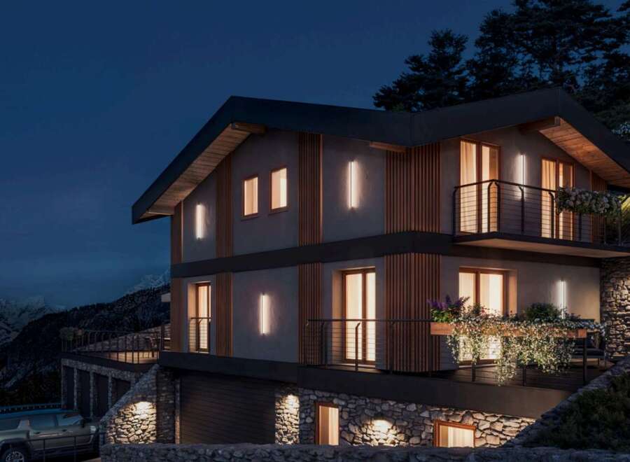 Discover this stunning modern house nestled in a picturesque mountain setting.