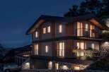Discover this stunning modern house nestled in a picturesque mountain setting.