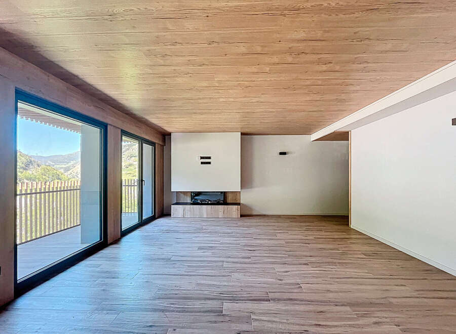 Stunning mountain views from this spacious, open-plan living area.